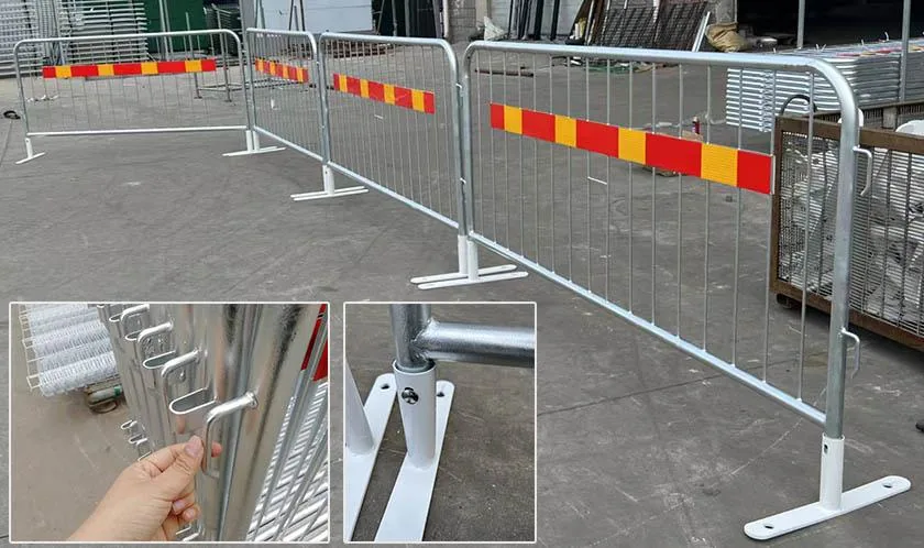 Galvanized steel crowd control barriers lined up at a venue entrance